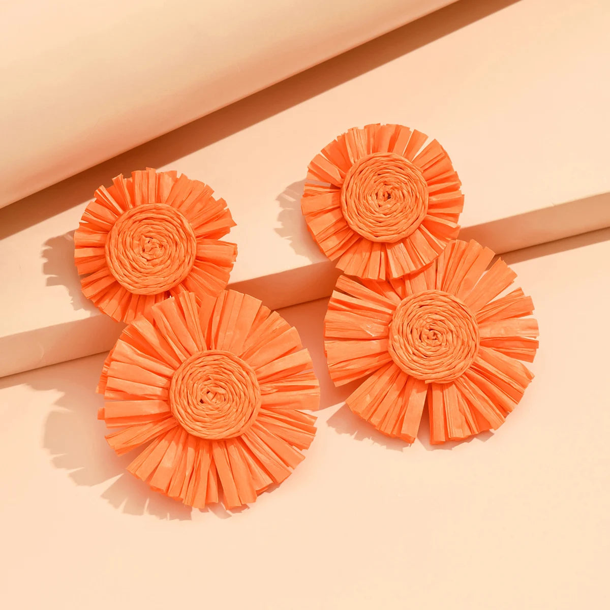 A Pair of Bold Sunflower Bohemian Hand-Woven Raffia Earrings in A Variety of Colors Suitable for Beach Vacation Balls