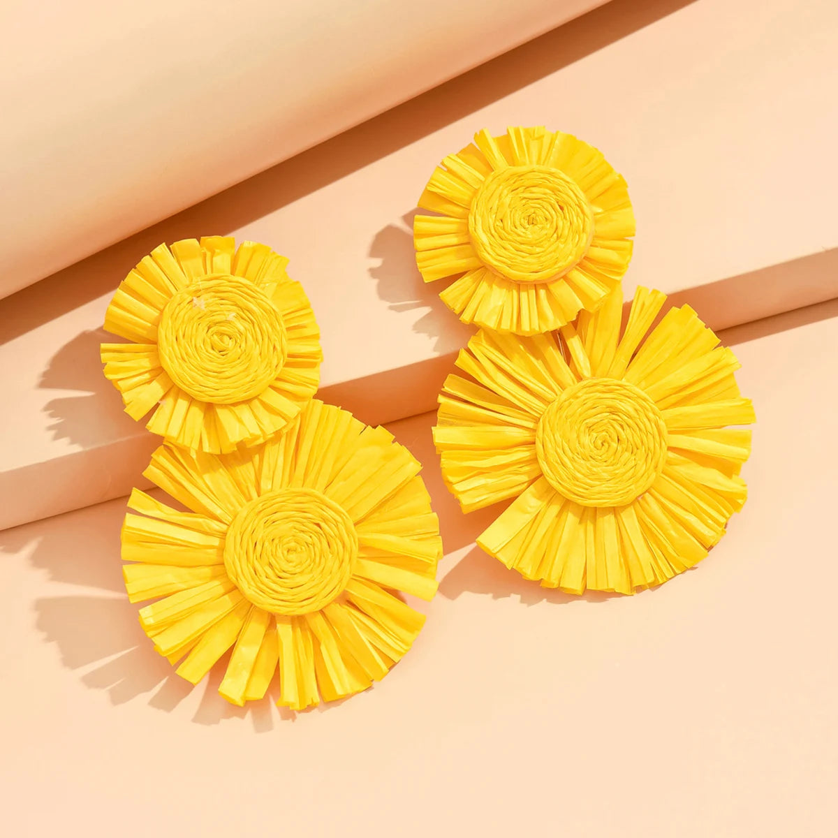 A Pair of Bold Sunflower Bohemian Hand-Woven Raffia Earrings in A Variety of Colors Suitable for Beach Vacation Balls